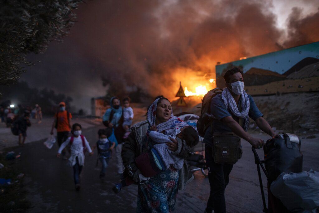 APTOPIX Greece Migrant Camp Blaze